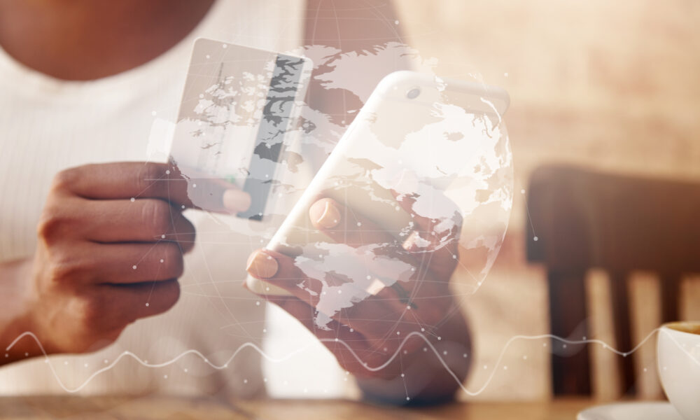 closeup-credit-card-smartphone-woman-s-hands-1000x600-1