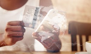 closeup-credit-card-smartphone-woman-s-hands-1000x600-2