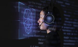 Female programmer scanning her face with biometric security tech